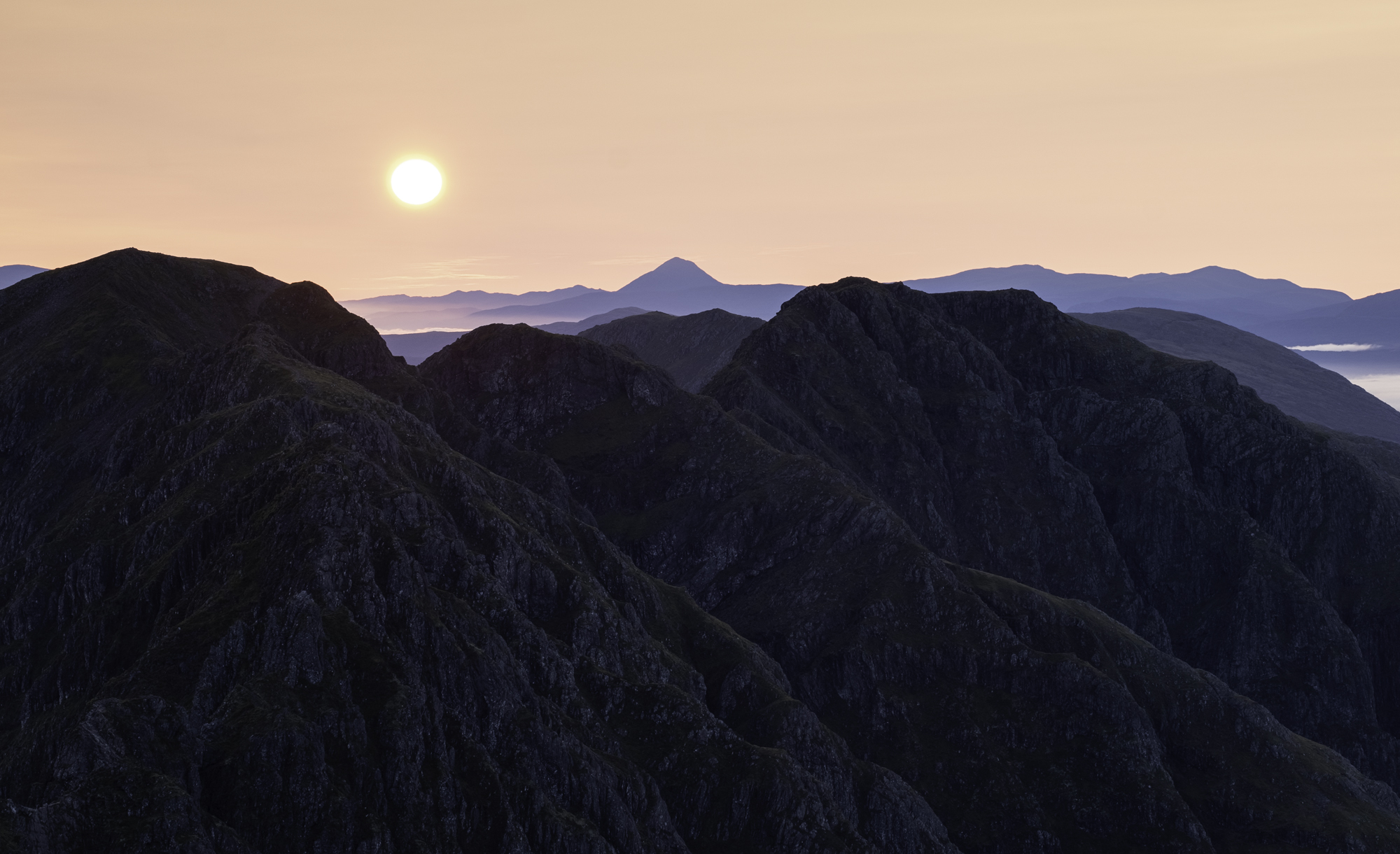 Landscape image taken of Aonach Eagach, Glencoe at sunrise