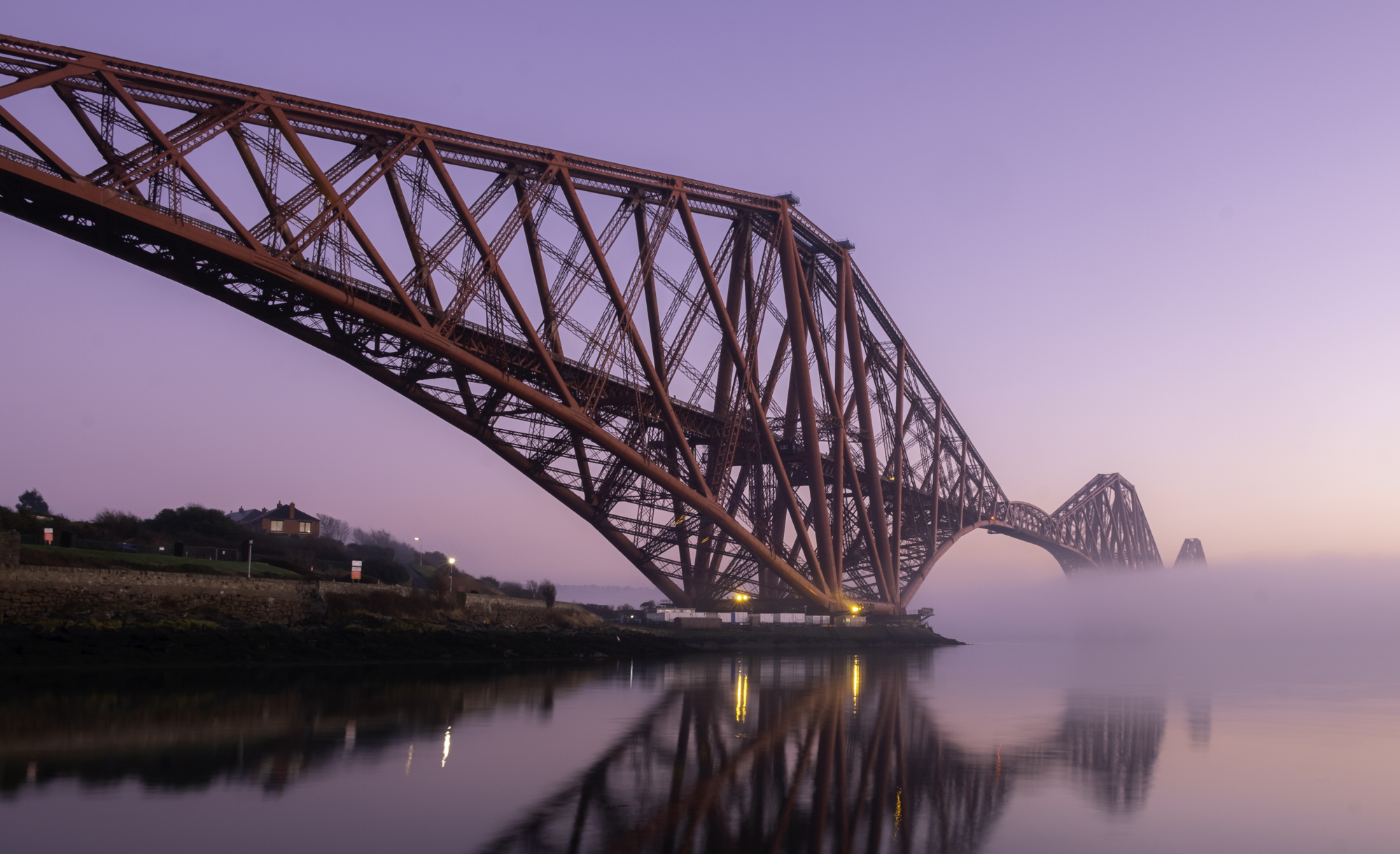Landscape image taken of the Forth Rail Bridge, North Queensferry at sunset
