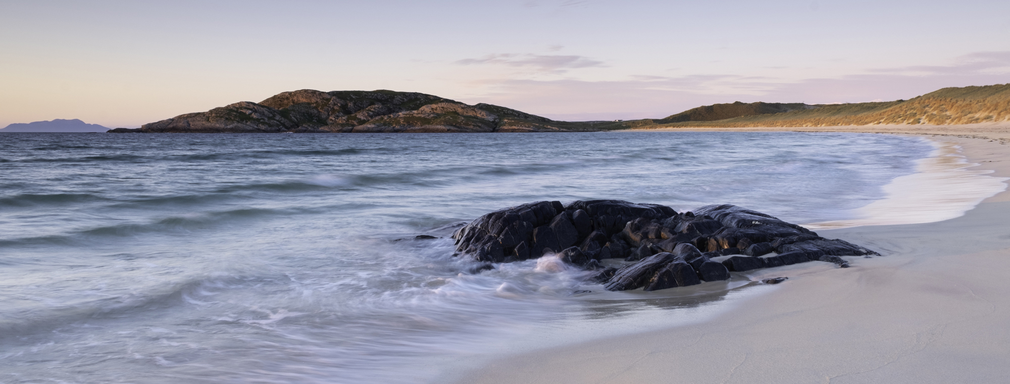 Landscape image taken of Feall Bay, Isle of Coll at sunset
